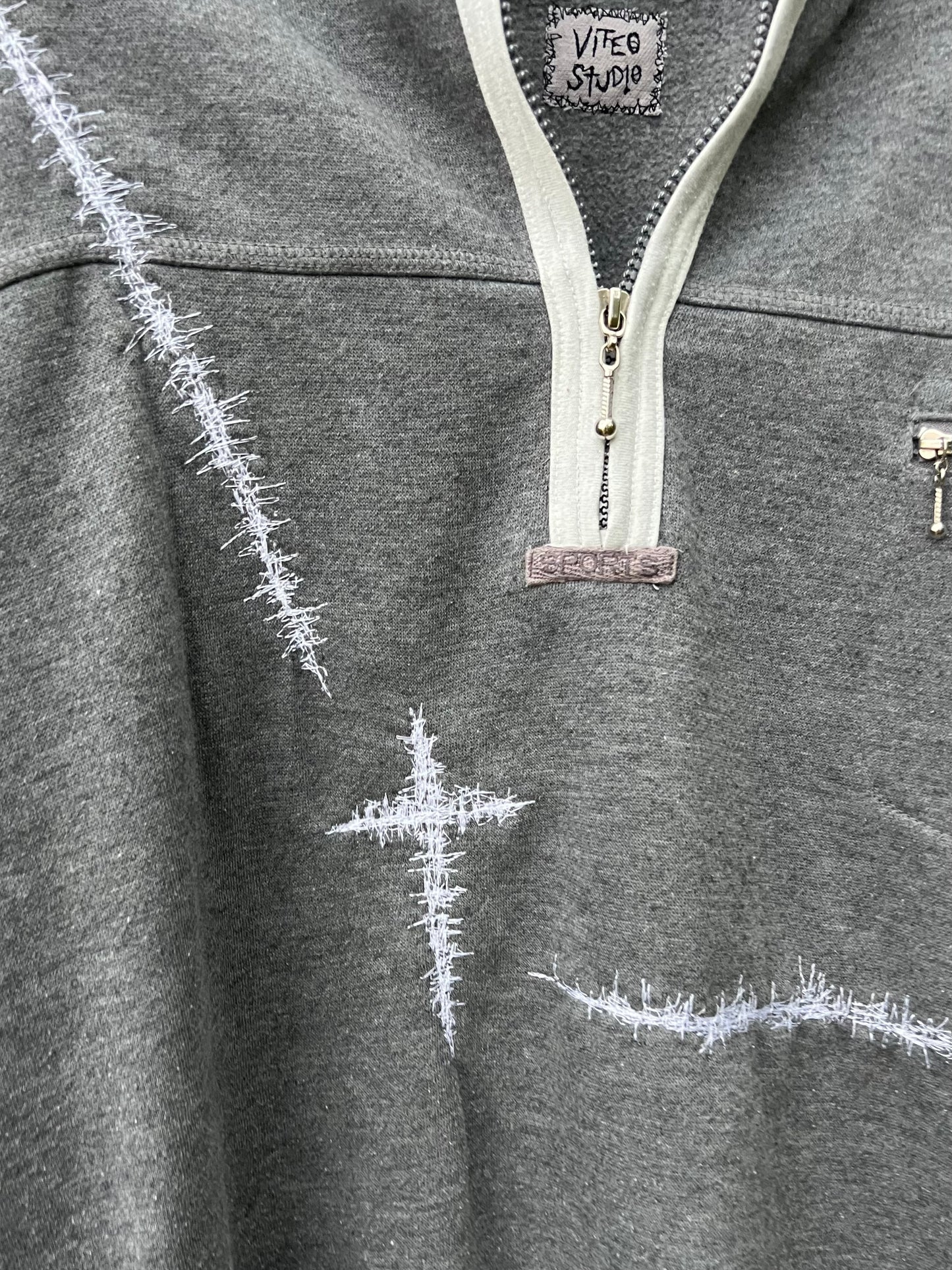 embroidered cross quarter zip